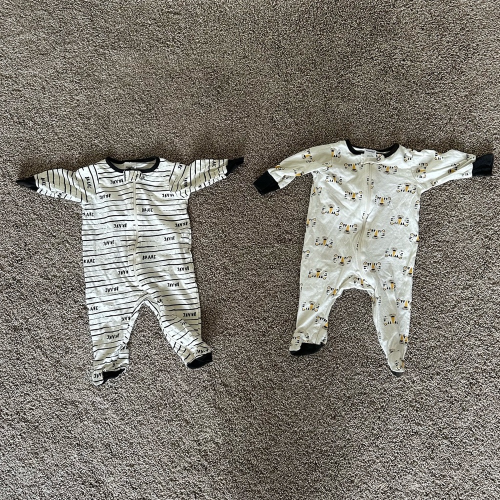 Two Lion Themed Onesies